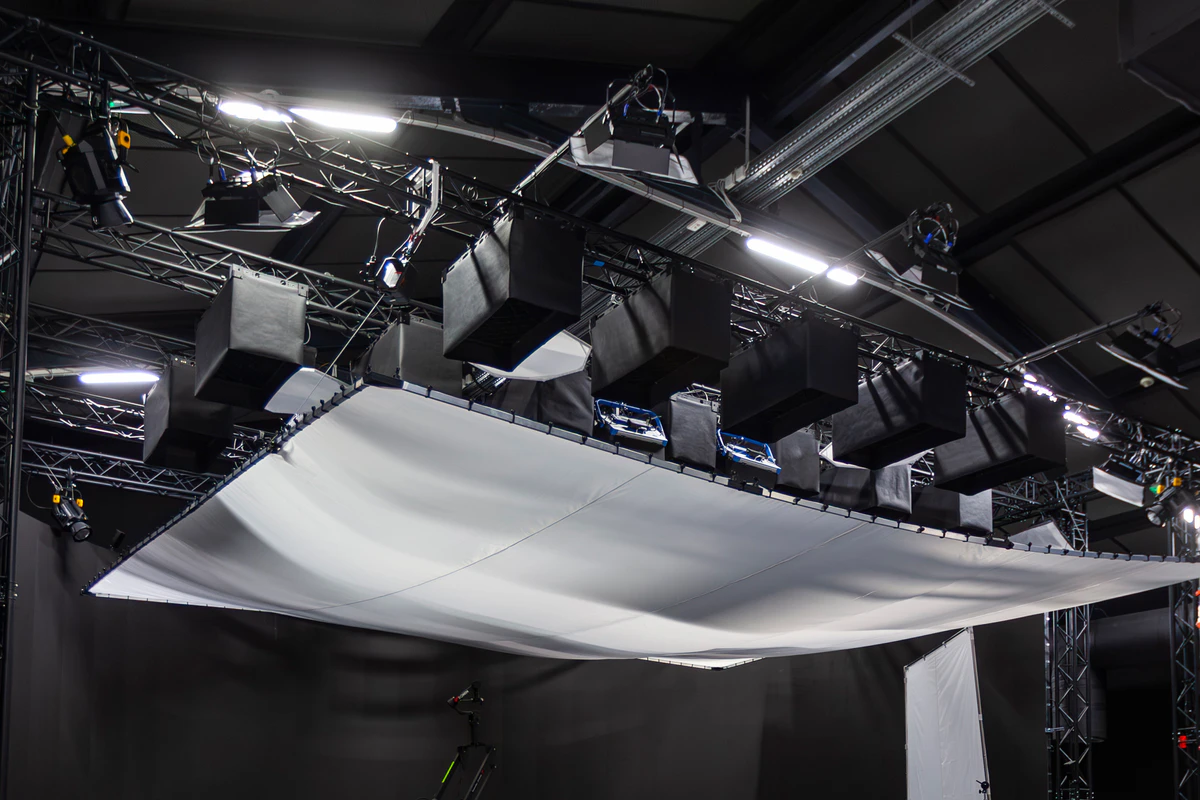 Ceiling LED lighting panels and a diffusion frame above the stage