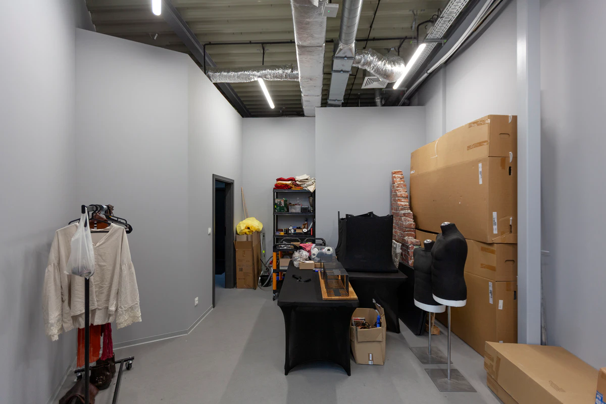Costume and prop store: a clothes rack and mannequins