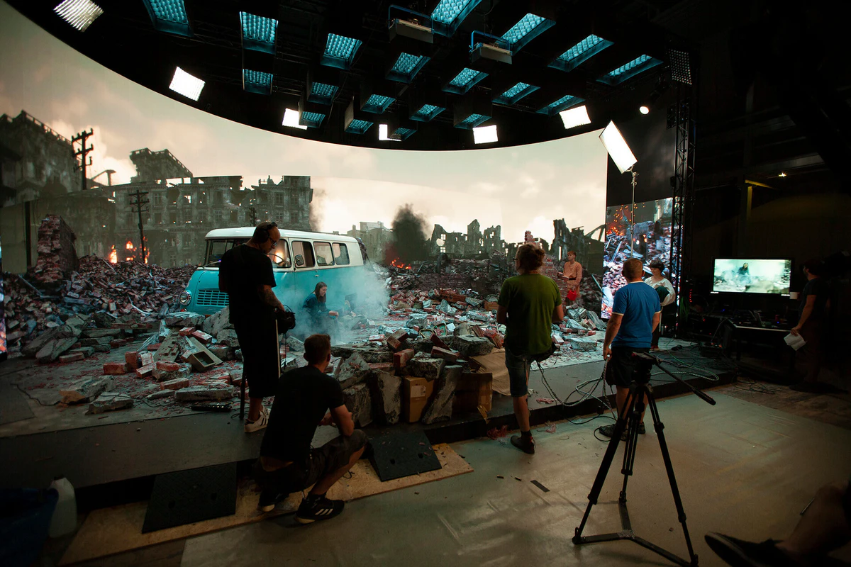 On set: city ruins and a car in front of the LED wall